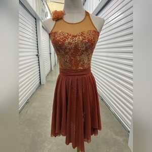 Orange dance costume or figure skating dress